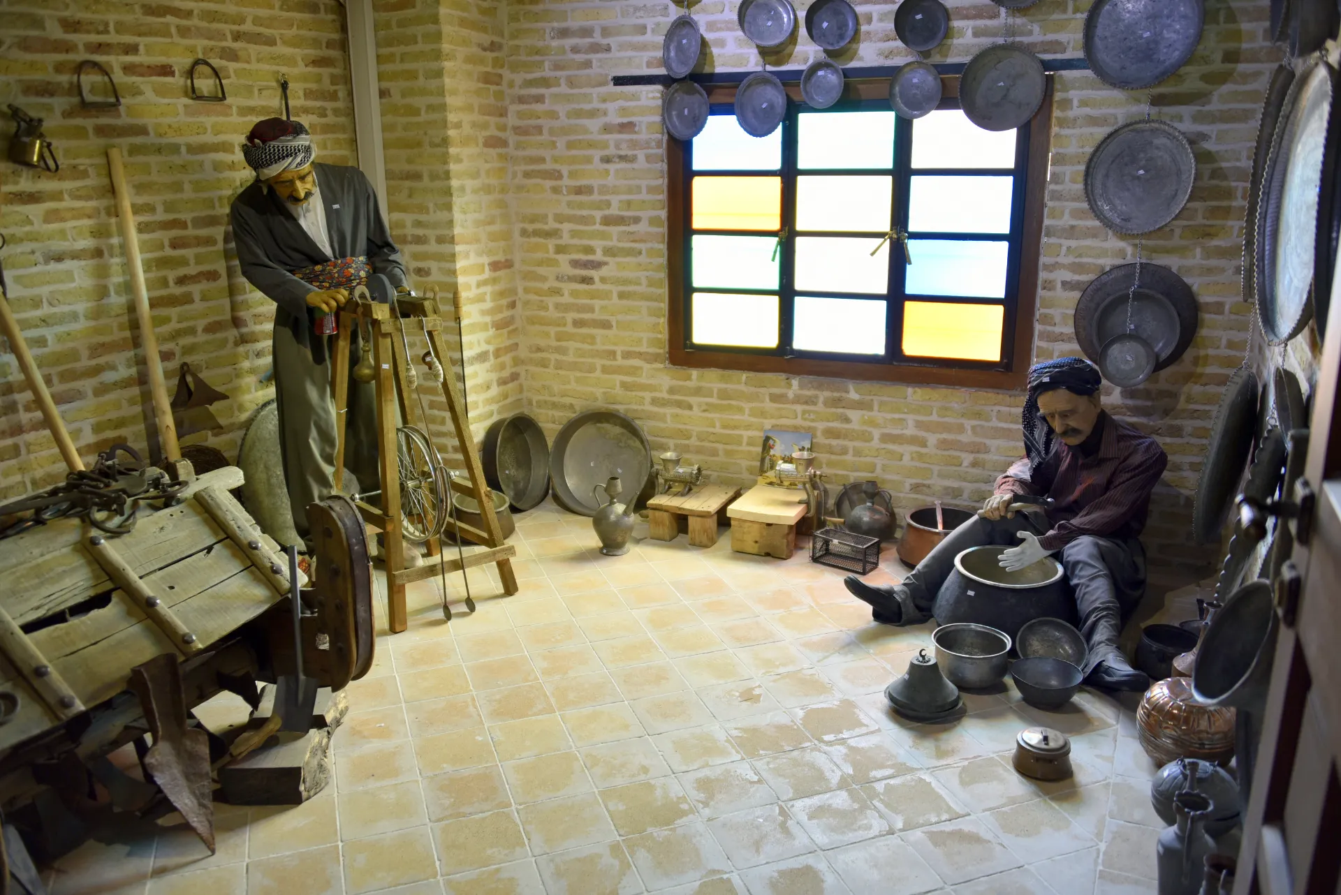 Coppersmith at work, Kurd's Heritage Museum, Sulaymaniyah