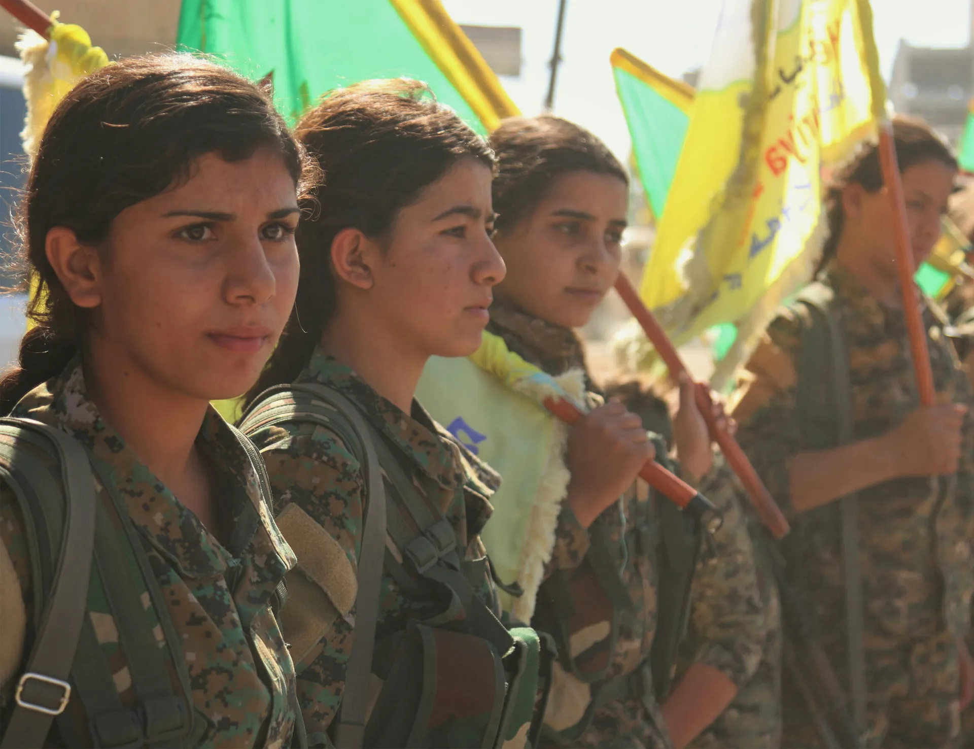 YPJ fighters with flags, Rojava